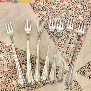 Vintage silver-plated appetizer forks by Reed and Barton. Monogram ‘D’